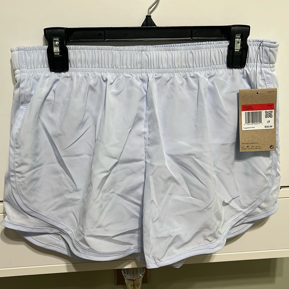 Women’s nike dri-fit tempo shorts size large lavender color.